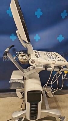 GE Ultrasound Vivid S6 - YOM 03/2014 - S/W 12.2 one probe plug to be repaired see picture -one missing wheel housing - cosmetic damage ( see picture) Options ATO/ASO - TM anatomic - tissue velocity imaging and tissue tracking - logiq view - virtual convex - 2