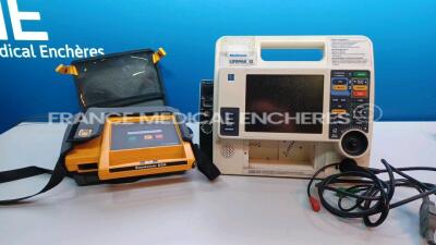 Lot of Medtronic Defibrillators including 1 x Automatic Defibrillators Lifepak 500 Training (Powers up) and 1 x Lifepak 12 - YOM 2002 -Missing Paddles- Batteries and Printer (Untested - See pictures) *05359-01/30666685*