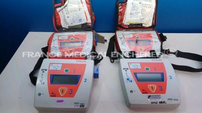 lot of 4 x Schiller Defibrillators Fred Easy - (All Power up - Batteries need to changed - Missing 2 x batteries - See pictures) *058990041934/058990041935/058990351138/058996066372*