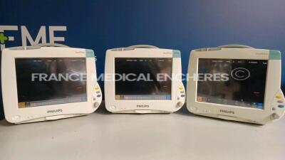 Lot of 3 x Philips Patient Monitors Intellivue Cardiac MP50 - YOM 2010 - S/W H.15.41 - French Language - w/ 3 x Philips Modules M3000A (All Power Up) *DE82083121/DE82083110/DE82083060/DE94553390/DE94543120/DE94531496*