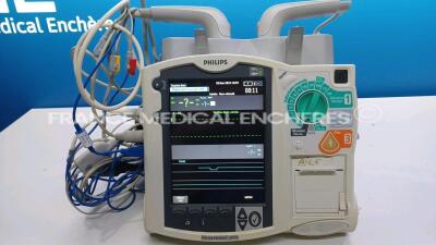 Philips Heartstart MRx Defibrillator - YOM 2012- Options - Pacer - ECG - Printer - w/ 2 x Philips Batteries M3538A/M3539A and 1 x ECG Leads and 1 x Cuff (Powers up) *US00559586*