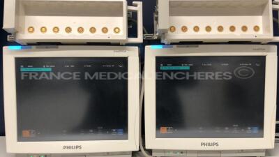 Lot of 2 Philips Patient Monitors MP70 - YOM 2003 w/ Philips module racks (Both power up)