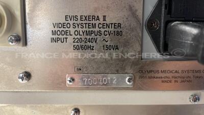 Lot of Olympus Light Source CLV-180 Evis Exera 2 - YOM 2011 and Olympus Video Processor CV-180 Evis Exera 2 - YOM 2011 and Olympus Pigtail Evis Exera 2 MAJ-1430 and Olympus Keyboard MAJ-1428 - All power up - 9