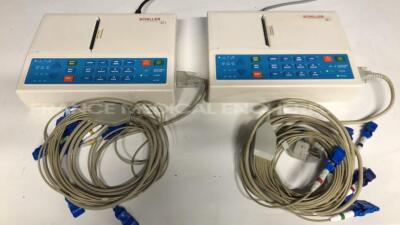 Lot of 2 Schiller ECG Cardiovit AT-1 w/ ECG Sensors (Both power up)