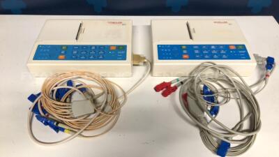 Lot of 2 Schiller ECG Cardiovit AT-1 w/ ECG Sensors (Both power up)